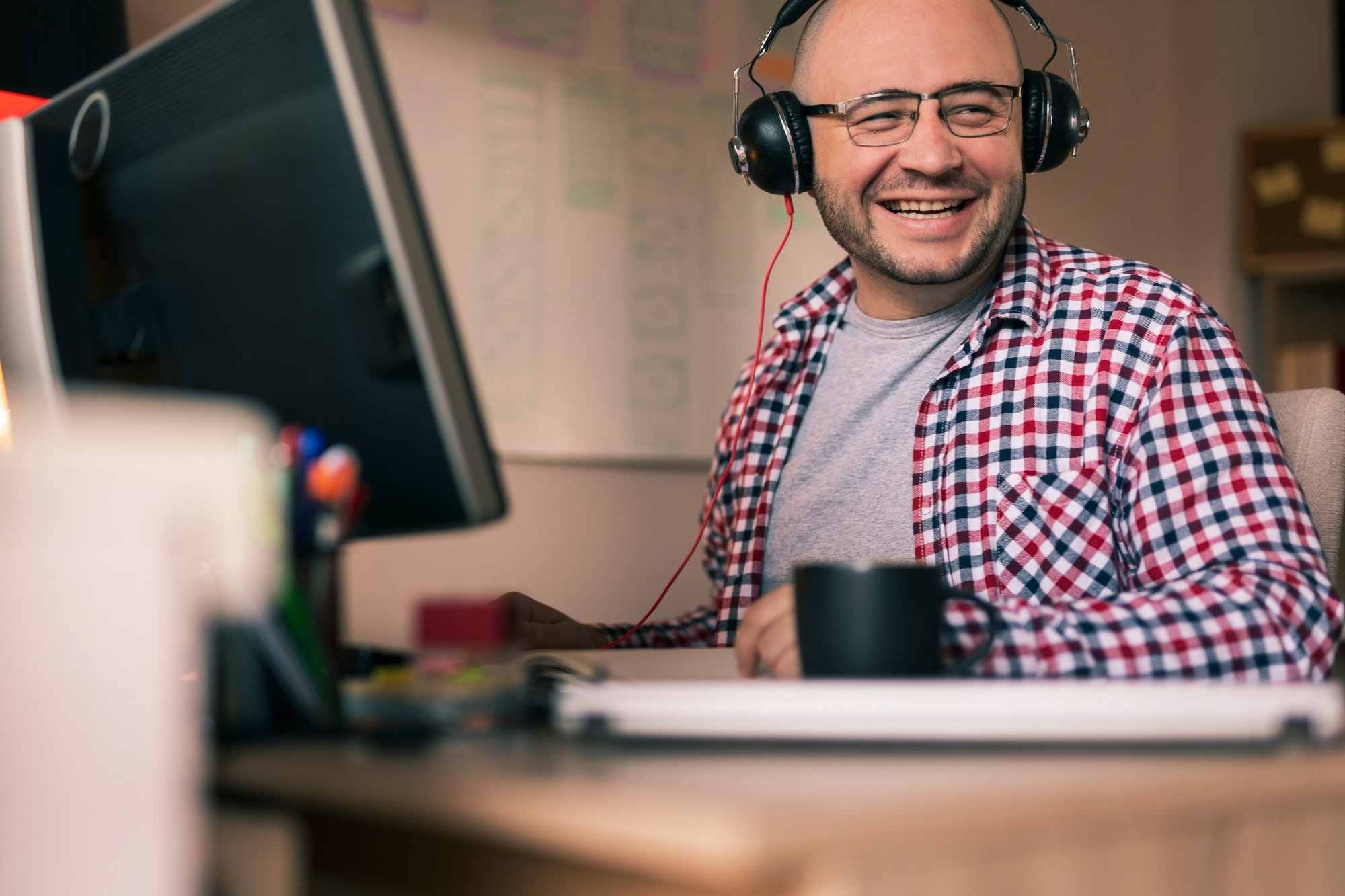 Male web designer working in an office